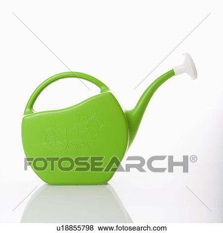 Green plastic watering can View Large Photo Image Stock Photo - Green plastic watering can . Fotosearch
