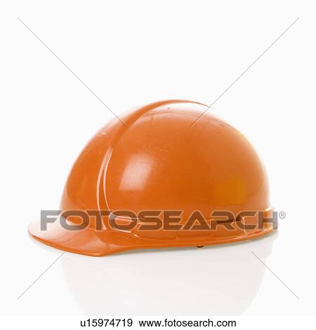 Stock Photo - Orange safety hard hat. Fotosearch