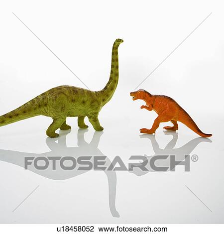 Plastic toy Tyrannosaurus and Apatosaurus dinosaurs View Large Photo Image Stock Image - Plastic toy Tyrannosaurus and Apatosaurus dinosaurs. Fotosearch