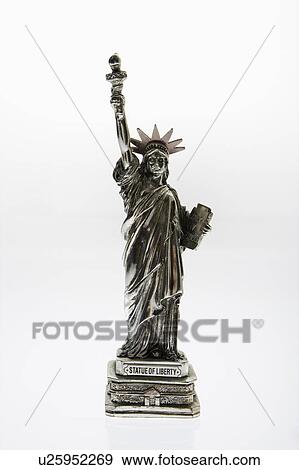 Stock Photo - Statue of Liberty reproduction on white background. Fotosearch