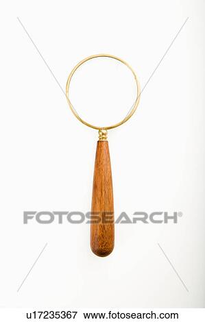 Stock Photo - Studio shot of magnifying glass. . Fotosearch