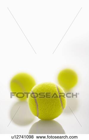 Stock Photo - Three tennis balls. Fotosearch