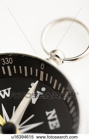 Stock Photography - Detail of compass pointing north.. Fotosearch
