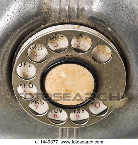 Stock Photo - Dial on rotary telephone.. Fotosearch