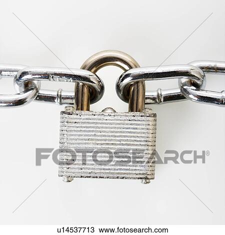Stock Image - Metal padlock locked to chains. Fotosearch