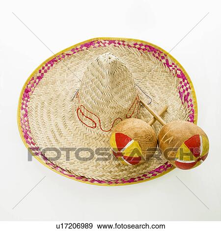 Pair of handmade Mexican maracas and sombrero View Large Photo Image Stock Photo - Pair of handmade Mexican maracas and sombrero. Fotosearch