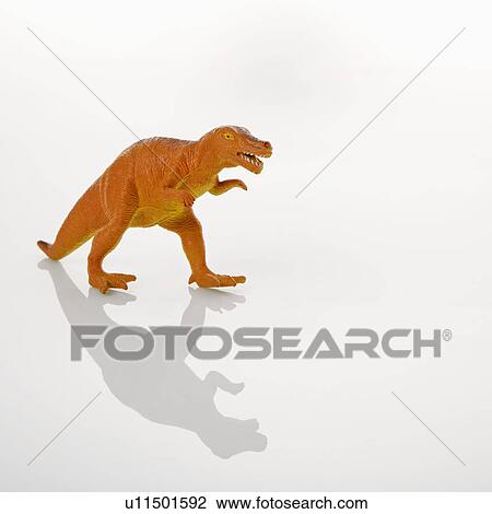 Stock Image - Plastic toy Tyrannosaurus dinosaur.. Fotosearch