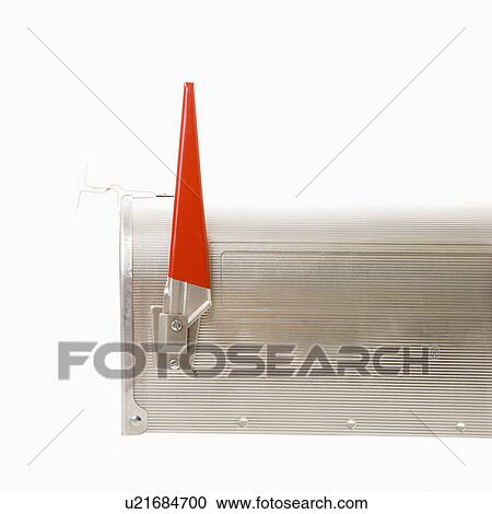 Stock Image - Shiny silver metal mailbox with flag up. Fotosearch
