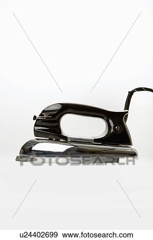 Vintage iron on white background View Large Photo Image Stock Photo - Vintage iron on white background. Fotosearch