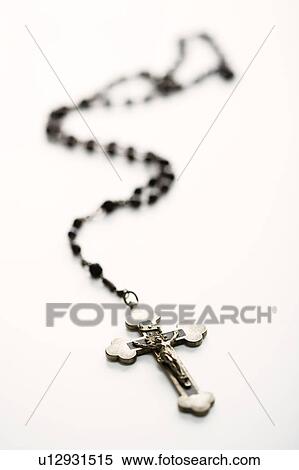 Stock Photography - Christian rosary beads with crucifix . Fotosearch