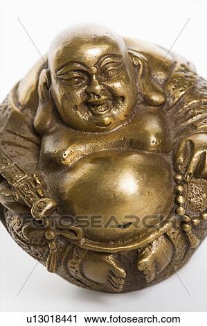 Happy laughing Buddha brass figurine View Large Photo Image Stock Image - Happy laughing Buddha brass figurine . Fotosearch