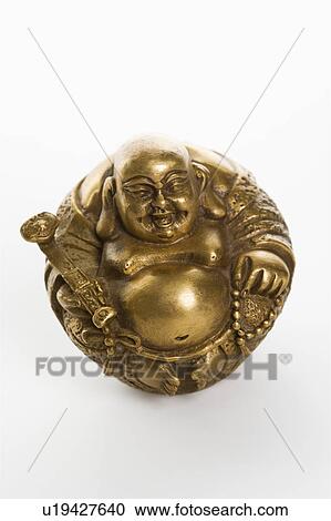 Happy laughing Buddha brass figurine View Large Photo Image Stock Image - Happy laughing Buddha brass figurine . Fotosearch