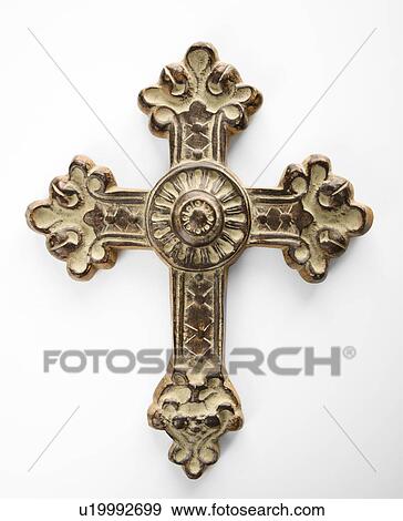 Stock Photo - Ornamental religious cross against white background.. Fotosearch