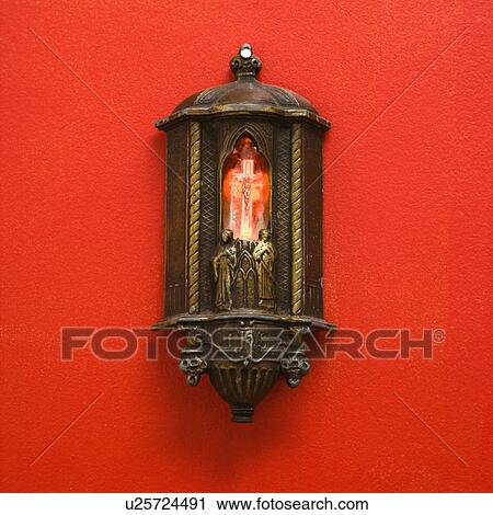 Religious light on red wall with illuminated Crucifixion of Jesus on cross. View Large Photo Image Stock Image - Religious light on red wall with illuminated Crucifixion of Jesus on cross.. Fotosearch