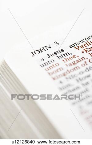 Stock Image - Selective focus of John 3 verses in open Holy Bible.. Fotosearch