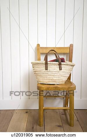 Basket on chair View Large Photo Image Stock Photography - Basket on chair. Fotosearch
