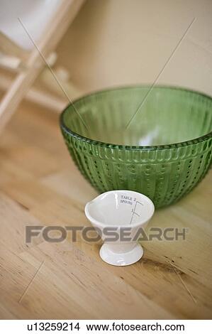 Bowl and measuring cup View Large Photo Image Picture - Bowl and measuring cup. Fotosearch