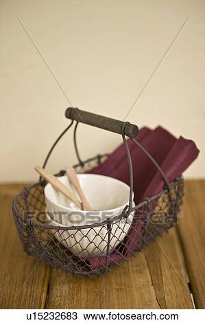 Stock Image - Bowls in basket. Fotosearch