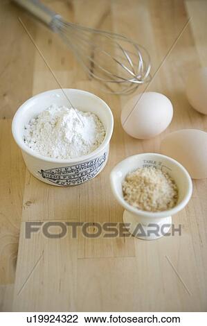 Flour in cup and eggs View Large Photo Image Stock Image - Flour in cup and eggs. Fotosearch