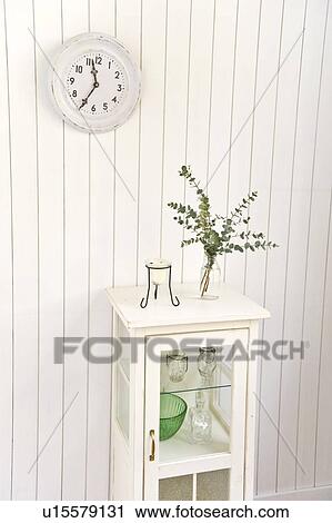 Stock Image - Potted plant on cabinet. Fotosearch