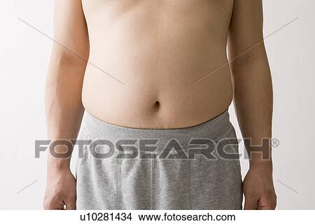 Picture - Overweight man's stomach. Fotosearch