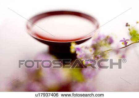 Stock Photograph - Sake and Thalictrum rochebrunianum. Fotosearch