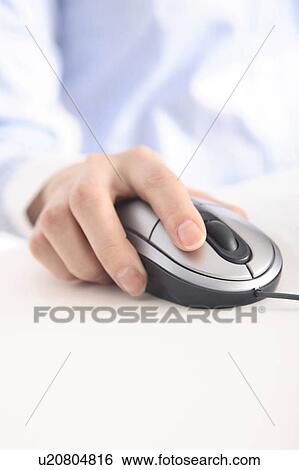 Hand of a woman clicking a mouse View Large Photo Image Stock Photograph - Hand of a woman clicking a mouse. Fotosearch