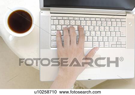 Hand which strikes a key board View Large Photo Image Stock Image - Hand which strikes a key board. Fotosearch