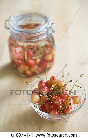 Stock Image - Cherry liquor and cherry. Fotosearch