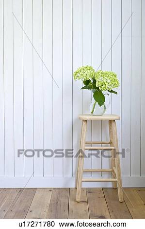Stock Image - Hydrangea on stool. Fotosearch