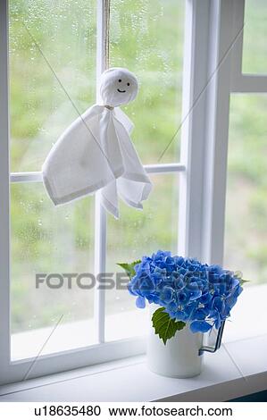 Stock Image - Paper doll for fine weather. Fotosearch