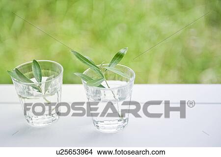 Two glasses near the window View Large Photo Image Picture - Two glasses near the window. Fotosearch