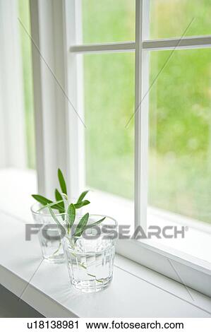 Two glasses near the window View Large Photo Image Stock Image - Two glasses near the window. Fotosearch