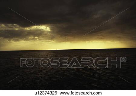 Clouds over the sea View Large Photo Image Stock Photograph - Clouds over the sea. Fotosearch