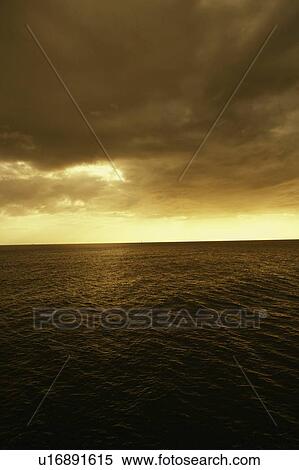 Stock Photography - Clouds over the sea. Fotosearch