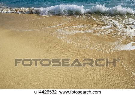 High angle view of waves breaking on the beach View Large Photo Image Stock Image - High angle view of waves breaking on the beach. Fotosearch