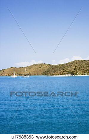 Stock Image - Sailboats in the sea. Fotosearch