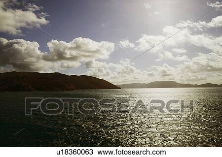 Silhouette of hills at the seaside View Large Photo Image Stock Image - Silhouette of hills at the seaside. Fotosearch