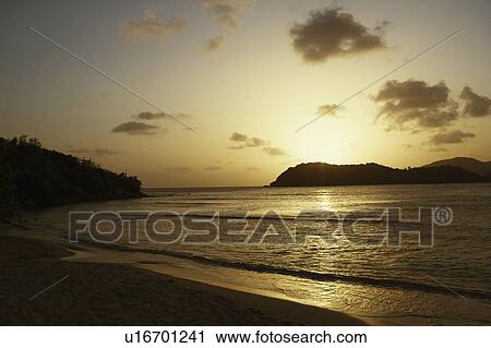 Stock Image - Silhouette of mountains at dusk. Fotosearch