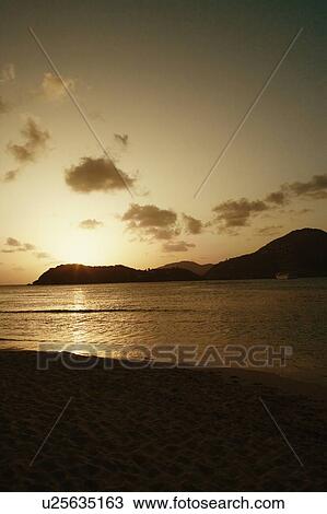 Silhouette of mountains at dusk View Large Photo Image Stock Image - Silhouette of mountains at dusk. Fotosearch