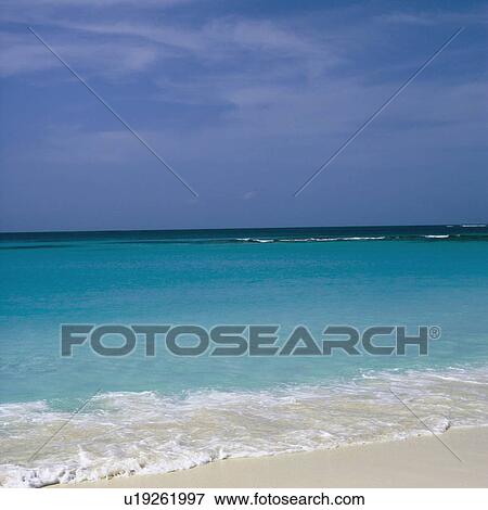 Tide on the beach View Large Photo Image Stock Photo - Tide on the beach. Fotosearch
