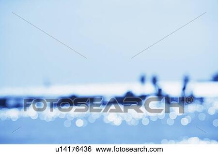Tourists on a jetty in the sea (Blur) View Large Photo Image Stock Photograph - Tourists on a jetty in the sea (Blur). Fotosearch