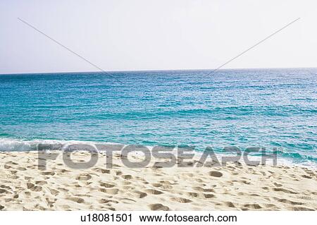 Stock Image - Waves on the beach. Fotosearch
