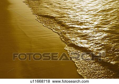 Waves on the beach View Large Photo Image Stock Photo - Waves on the beach. Fotosearch
