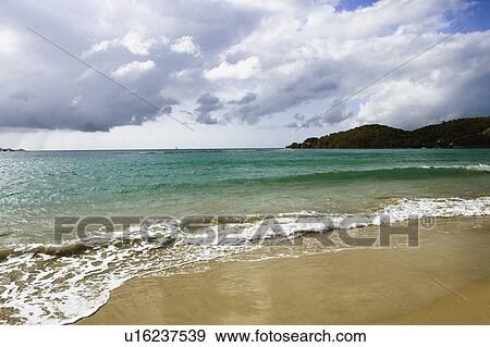 Waves on the beach View Large Photo Image Stock Photo - Waves on the beach. Fotosearch