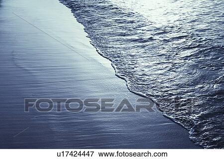 Stock Photo - Waves on the beach. Fotosearch