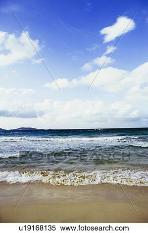 Stock Photography - Waves on the beach. Fotosearch