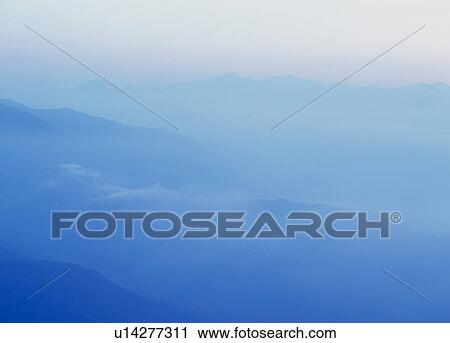 Stock Image - "Cloudscape And Mountain, Nagano, Japan". Fotosearch