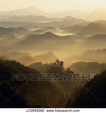Stock Image - "Morning Glow And Mountains, Nara, Japan". Fotosearch