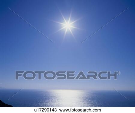 Stock Image - "Ocean And Sun, Tokyo, Japan". Fotosearch